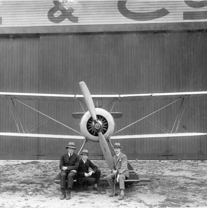 Roy Chadwick seated right with the Avro Antarctic Baby and Major Carr, pilot of the Shackleton Expedition